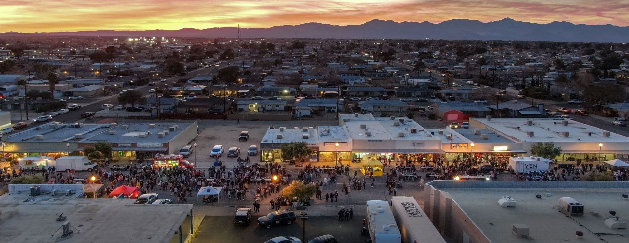 Aerial view of Ridgecrest at sunset with the Sierra Nevada in the background